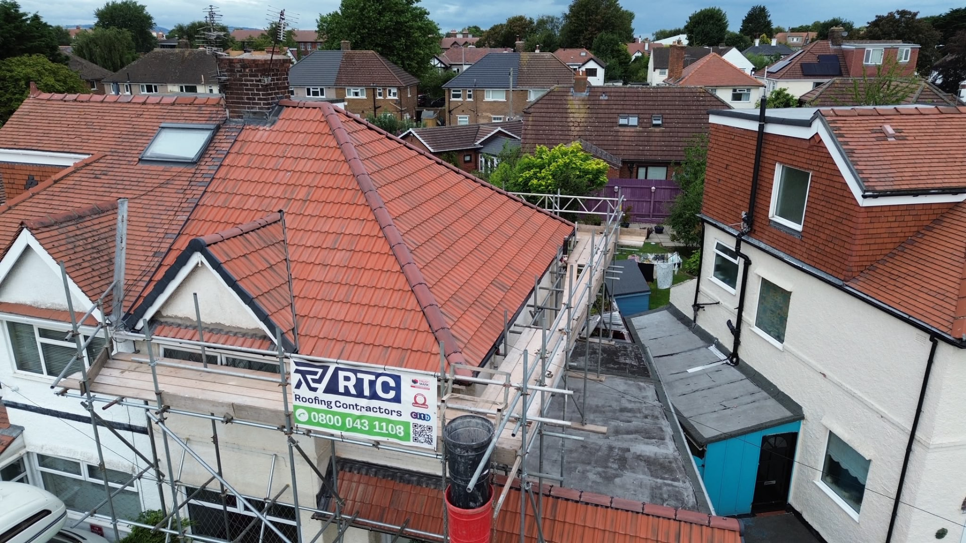 After: brand-new red tile re-roof with dry-ridge system, fresh valleys and clean verges completed by RTC Roofing Contractors